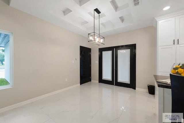 dining area with beam ceiling, coffered ceiling, and a chandelier