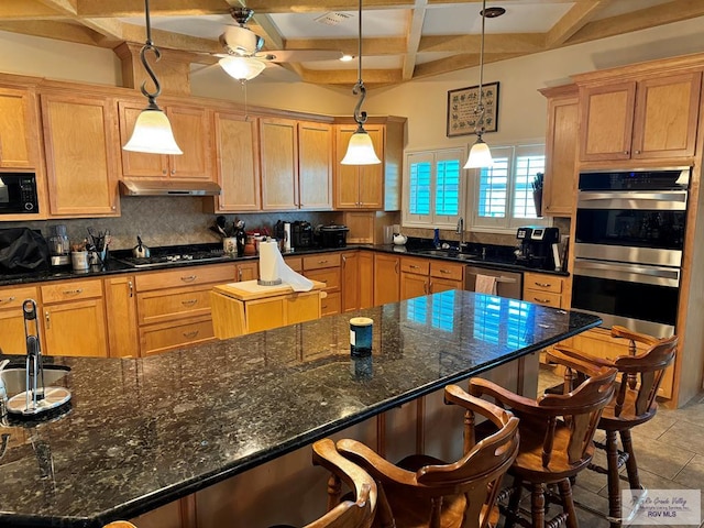 kitchen featuring coffered ceiling, stainless steel appliances, beam ceiling, a center island, and hanging light fixtures