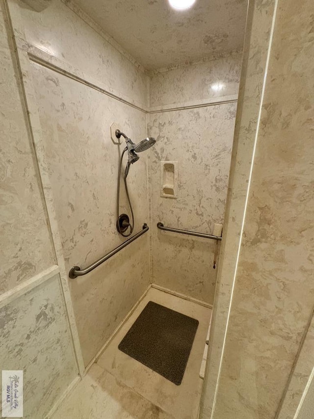 bathroom with a shower