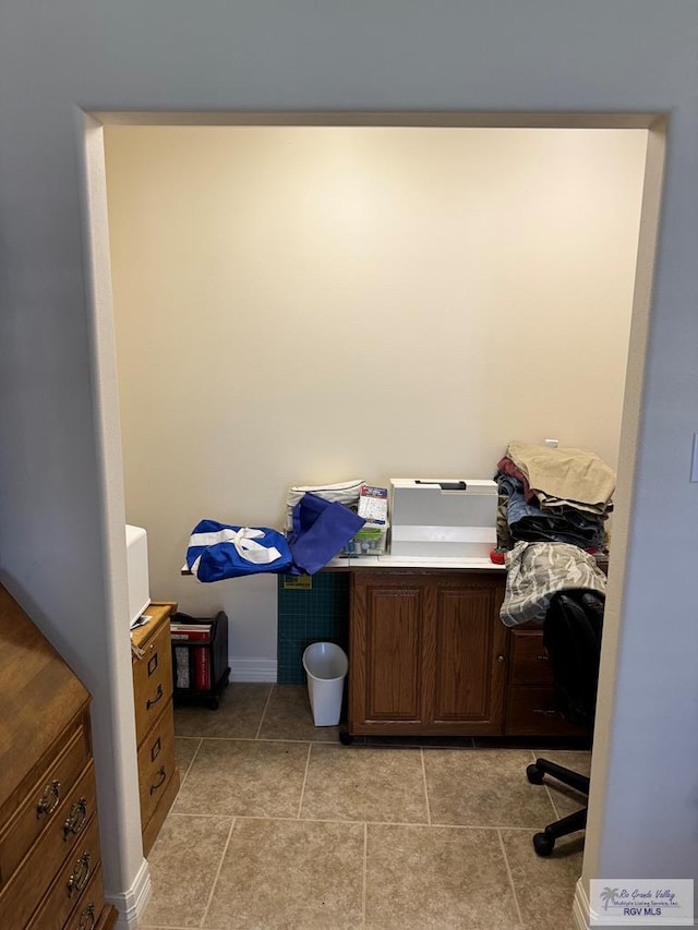 bathroom with tile patterned flooring