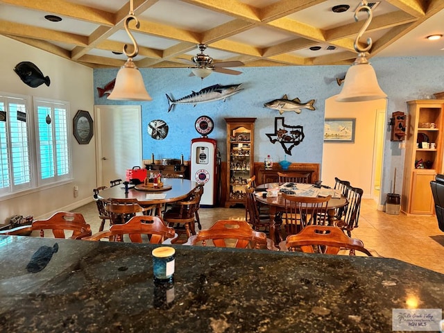 dining area featuring beamed ceiling, light tile patterned floors, ceiling fan, and coffered ceiling