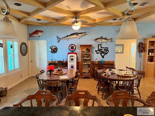 tiled dining area with beam ceiling, ceiling fan, and coffered ceiling