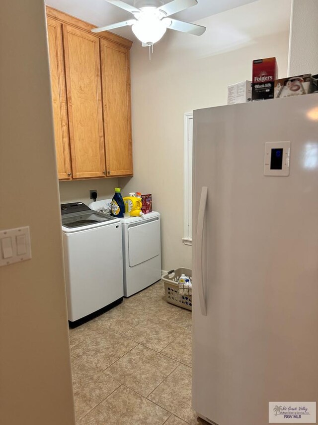 washroom with washer and dryer, ceiling fan, cabinets, and light tile patterned floors