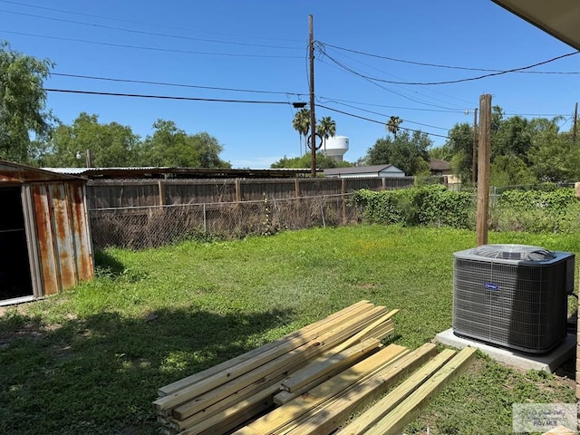 view of yard with central AC unit