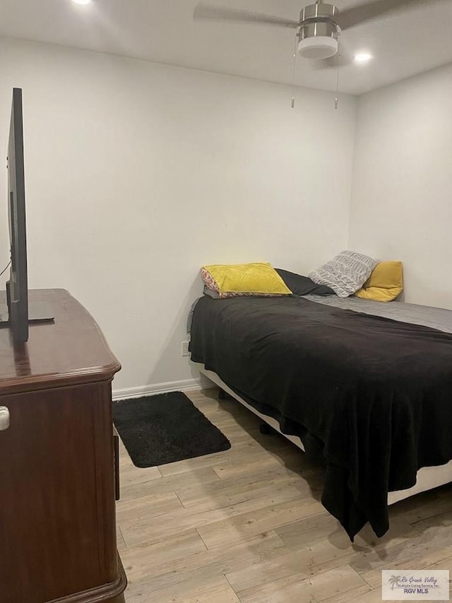 220 Country Club Rd Unit 2, Brownsville, TX 78520 - bedroom with light wood-style floors, recessed lighting, ceiling fan, and baseboards