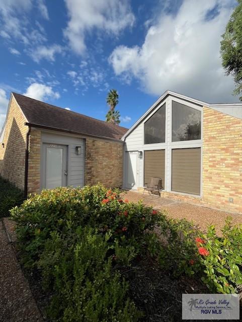 220 Country Club Rd Unit 2, Brownsville, TX 78520 - view of front of house with brick siding