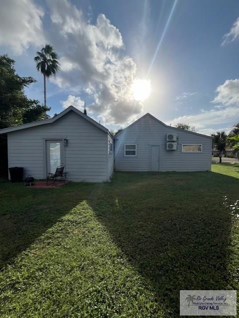 220 Country Club Rd Unit 2, Brownsville, TX 78520 - exterior space with a yard