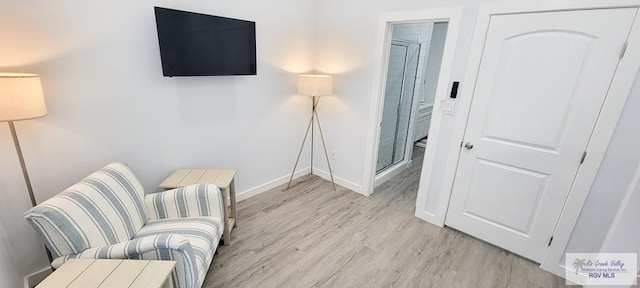 living area with light wood-type flooring