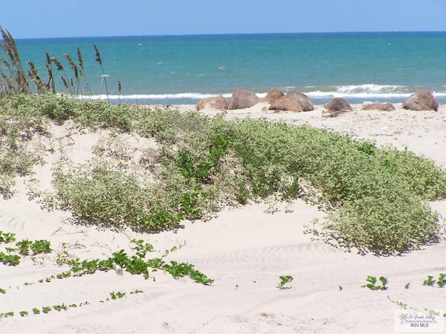 property view of water with a beach view