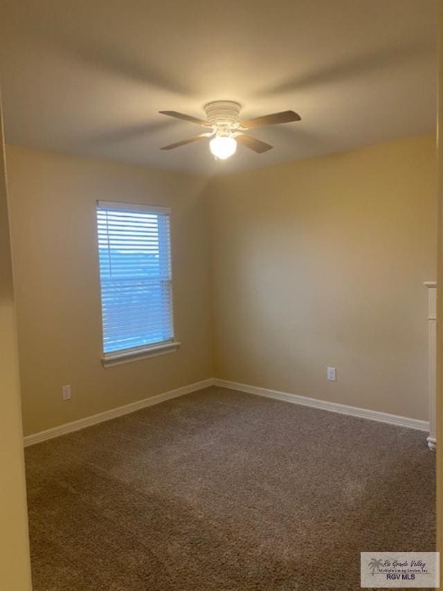 carpeted empty room with ceiling fan