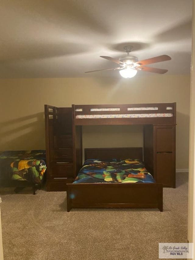 bedroom featuring carpet and ceiling fan