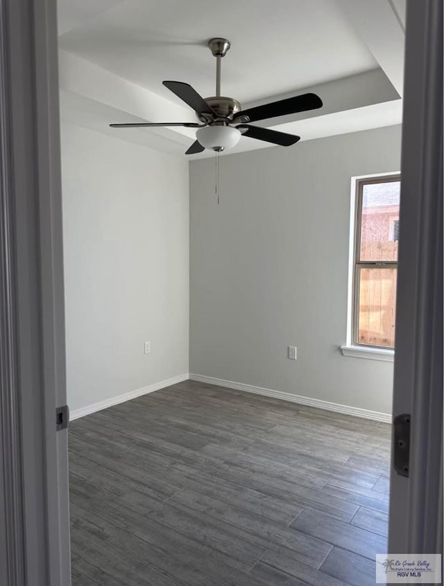 empty room with dark hardwood / wood-style floors