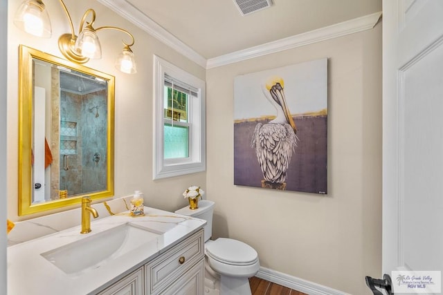 full bathroom with visible vents, crown molding, toilet, tiled shower, and vanity