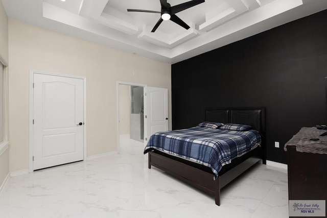 bedroom featuring marble finish floor, a towering ceiling, ceiling fan, coffered ceiling, and baseboards