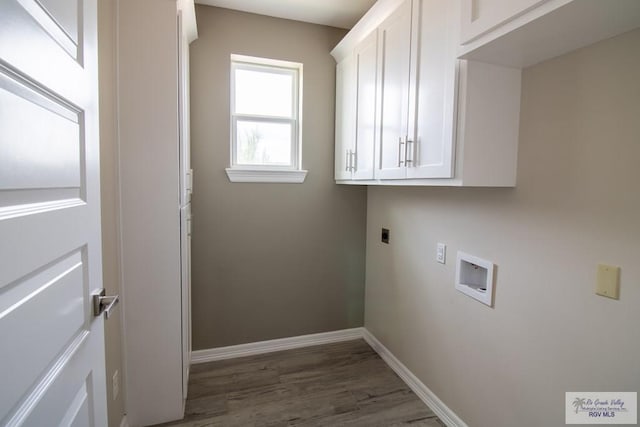 washroom with hookup for an electric dryer, dark hardwood / wood-style flooring, cabinets, and hookup for a washing machine