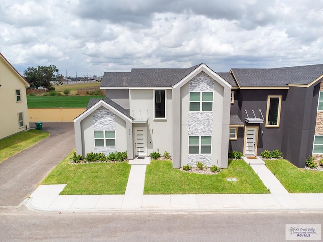 view of front of house with a front lawn