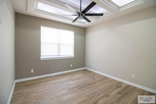 unfurnished room featuring ceiling fan and light hardwood / wood-style floors