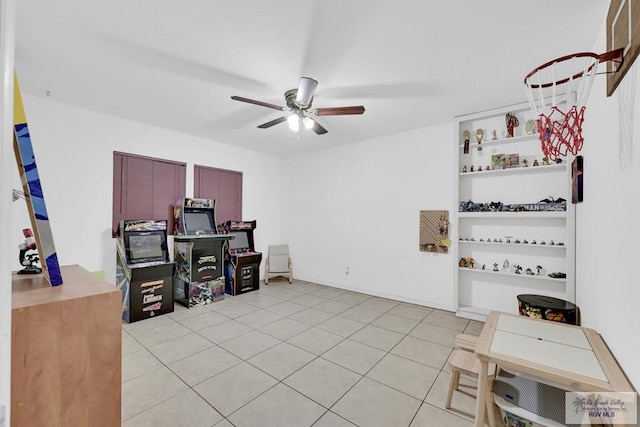 office space with ceiling fan and light tile patterned flooring