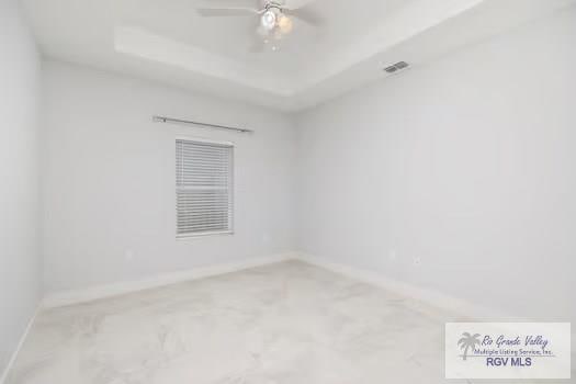 unfurnished room with ceiling fan