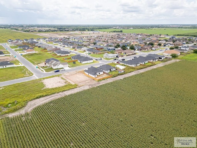 2409 Brown Pelican Ln, Harlingen, TX 78552 - aerial perspective of suburban area with large plots for crops