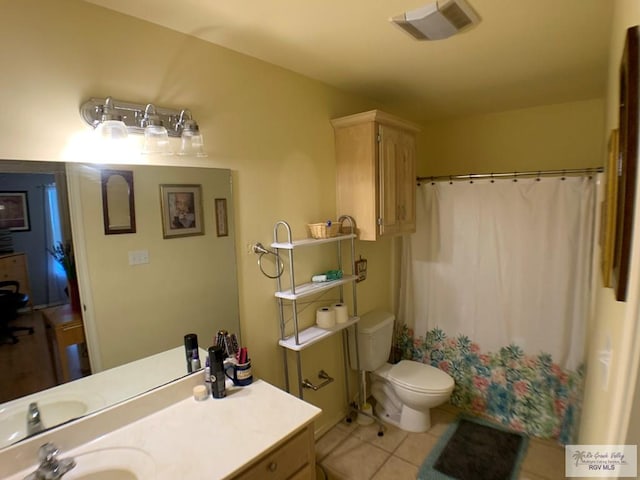14022 Whitewing Ln, Lyford, TX 78569 - bathroom with tile patterned floors, toilet, a shower with shower curtain, and vanity