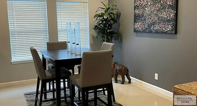 6251 Camelot Dr, Harlingen, TX 78550 - dining area featuring baseboards