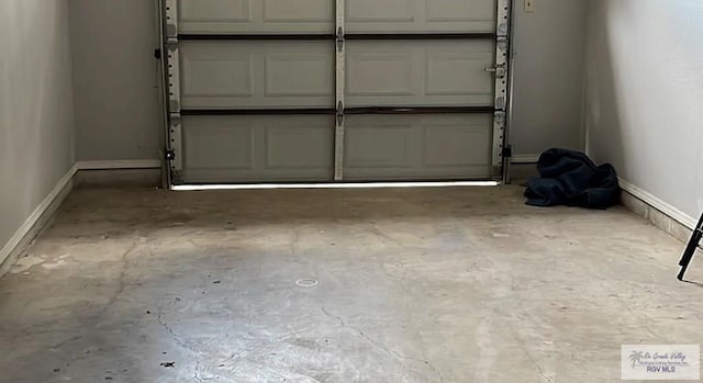 6251 Camelot Dr, Harlingen, TX 78550 - garage with baseboards
