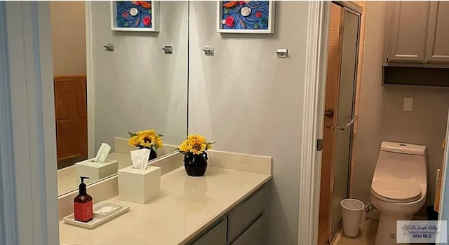 6251 Camelot Dr, Harlingen, TX 78550 - full bath featuring toilet, a shower stall, and vanity
