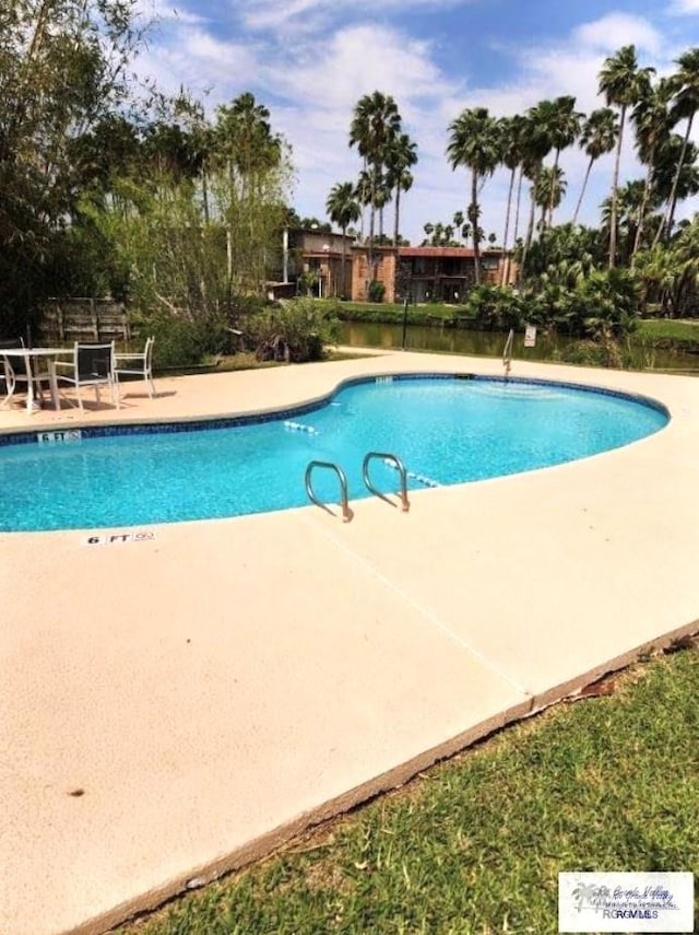 view of pool with a patio area