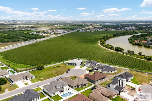 drone / aerial view featuring a water view
