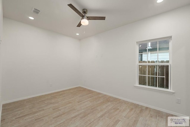 861 Rio Grande St, San Benito, TX 78586 - empty room with light wood finished floors, a ceiling fan, recessed lighting, and baseboards