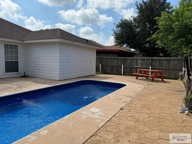 view of pool featuring a patio area