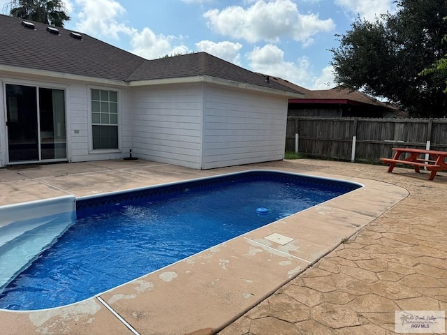 view of pool with a patio