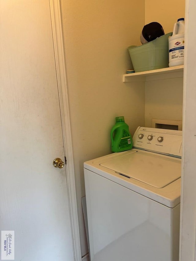 washroom featuring washer / clothes dryer