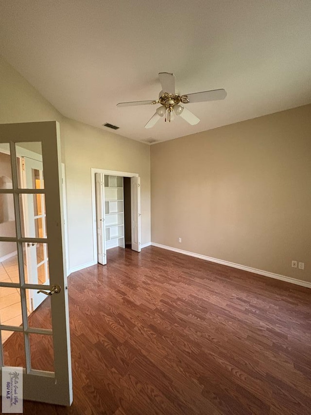 901 Plantation St, Brownsville, TX 78526 - spare room featuring wood finished floors, baseboards, and ceiling fan