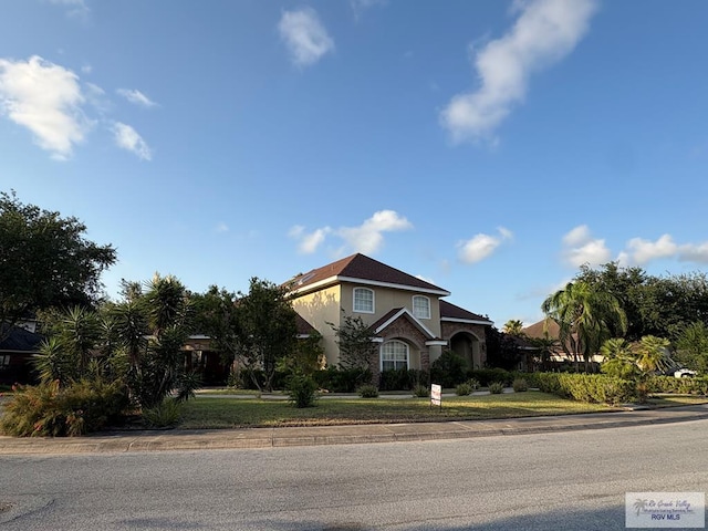 901 Plantation St, Brownsville, TX 78526 - view of front of house with stucco siding