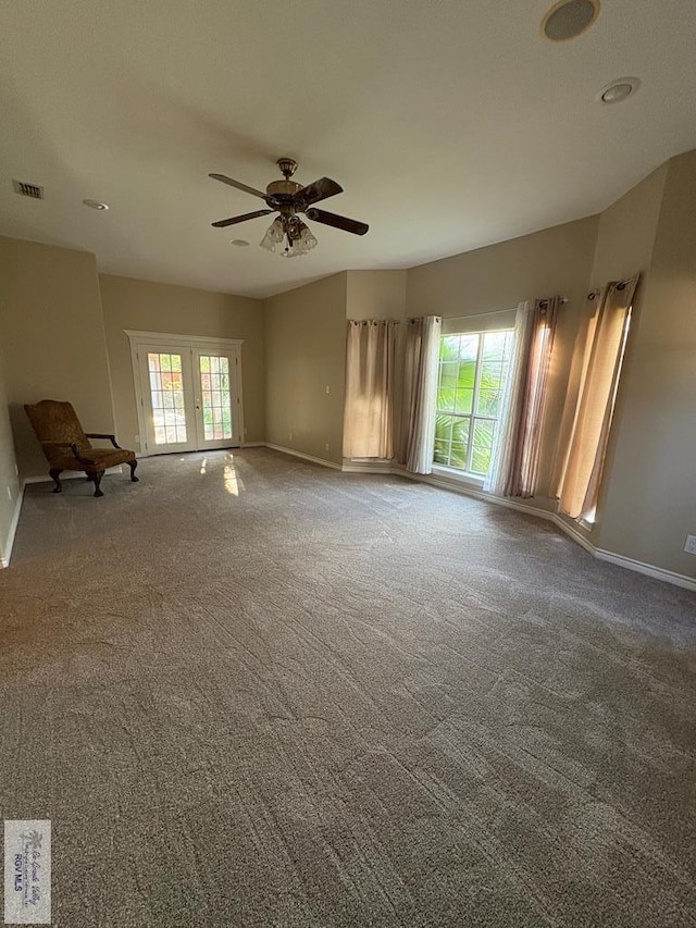 901 Plantation St, Brownsville, TX 78526 - spare room with plenty of natural light, baseboards, and ceiling fan