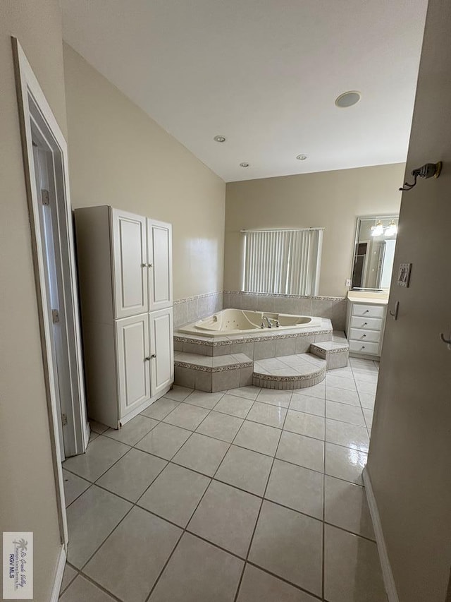 901 Plantation St, Brownsville, TX 78526 - full bathroom featuring vanity, a garden tub, tile patterned flooring, and recessed lighting