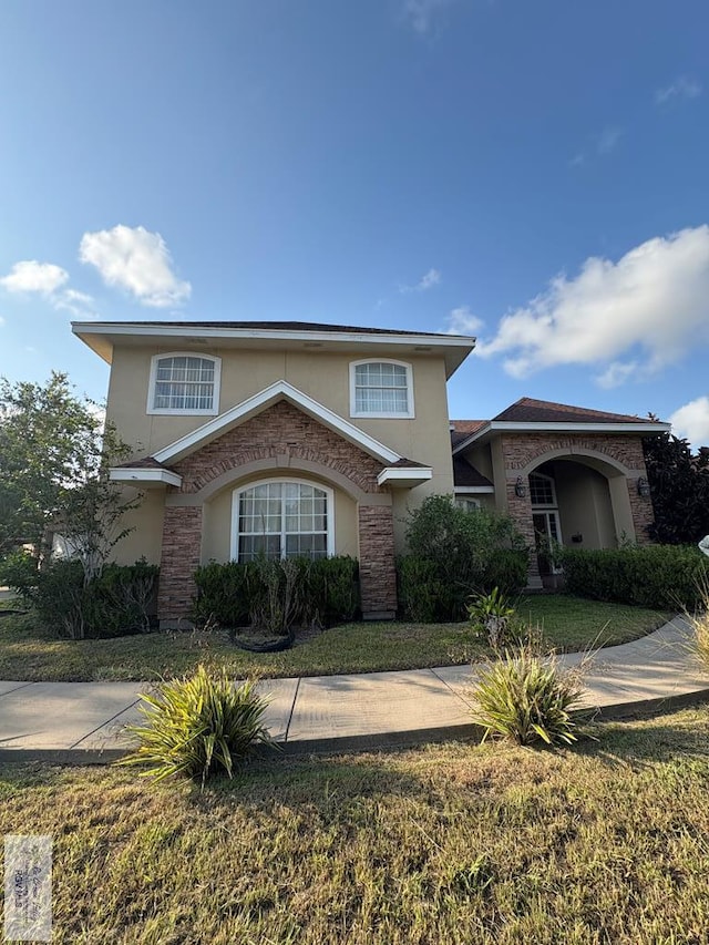 901 Plantation St, Brownsville, TX 78526 - traditional-style house with stucco siding