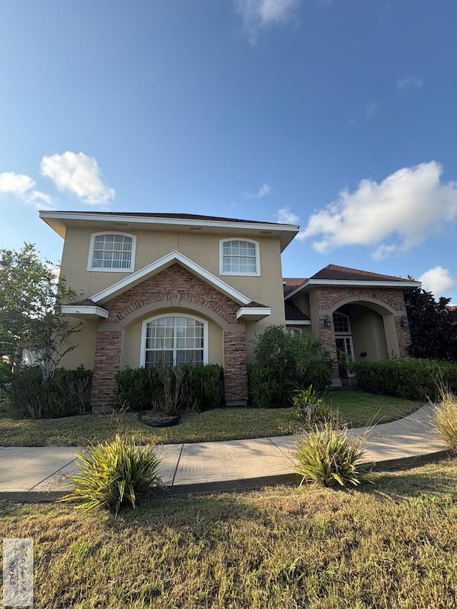 901 Plantation St, Brownsville, TX 78526 - traditional-style home with stucco siding and stone siding
