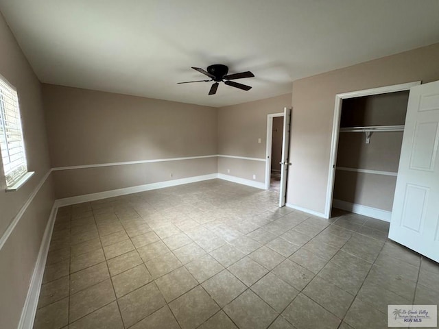 2805 Swiss Pine Ct, Harlingen, TX 78550 - unfurnished bedroom featuring tile patterned flooring, a closet, a ceiling fan, and baseboards