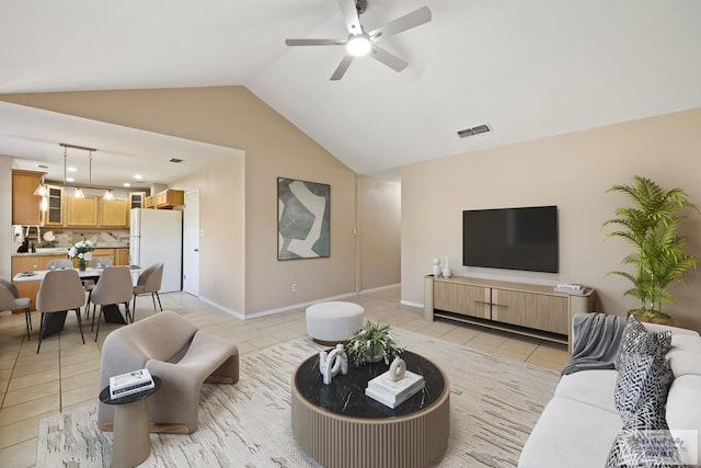 2805 Swiss Pine Ct, Harlingen, TX 78550 - living room with light tile patterned floors, lofted ceiling, and a ceiling fan