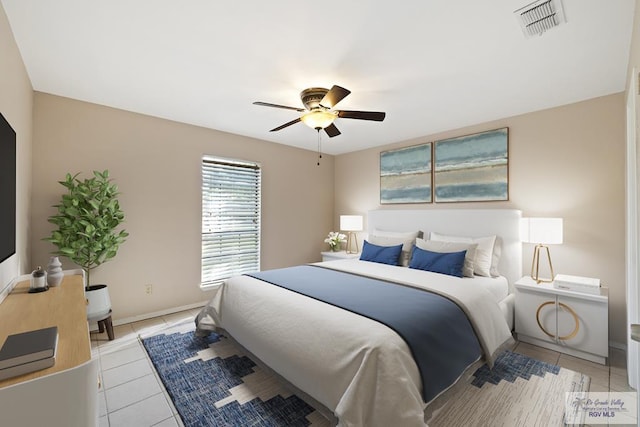 2805 Swiss Pine Ct, Harlingen, TX 78550 - bedroom with light tile patterned flooring and a ceiling fan