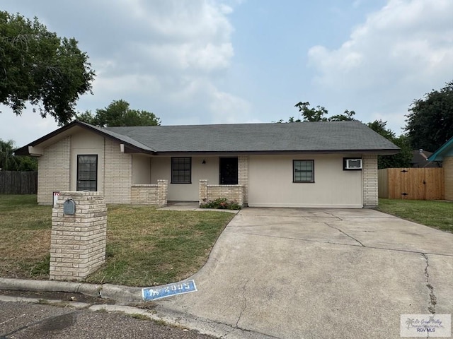2805 Swiss Pine Ct, Harlingen, TX 78550 - ranch-style home with driveway and brick siding