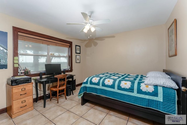 bedroom featuring light tile patterned floors and ceiling fan