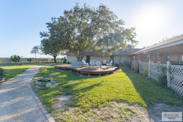 view of yard featuring a deck