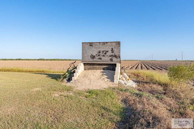 view of outbuilding featuring a rural view