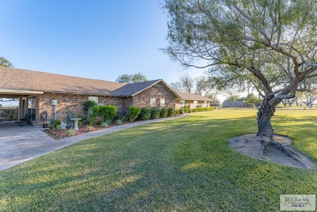 exterior space featuring a lawn