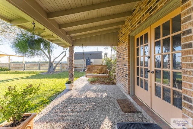 view of patio featuring french doors