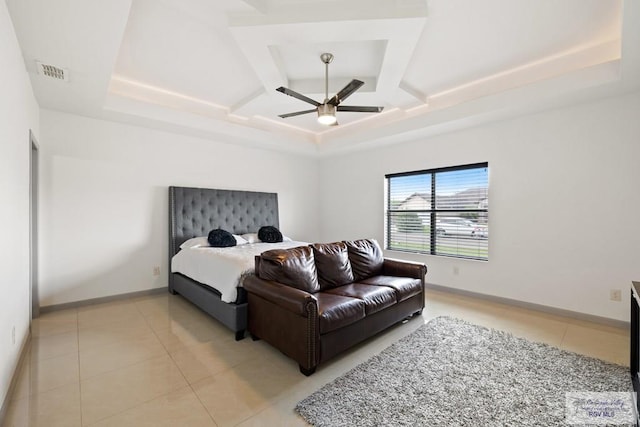 bedroom featuring ceiling fan, light tile patterned floors, and coffered ceiling